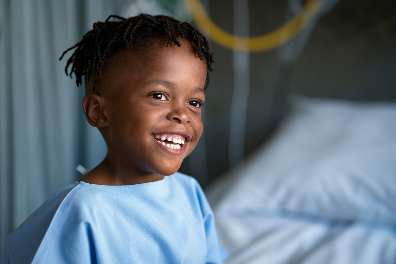 Smiling boy looking away at children's hospital