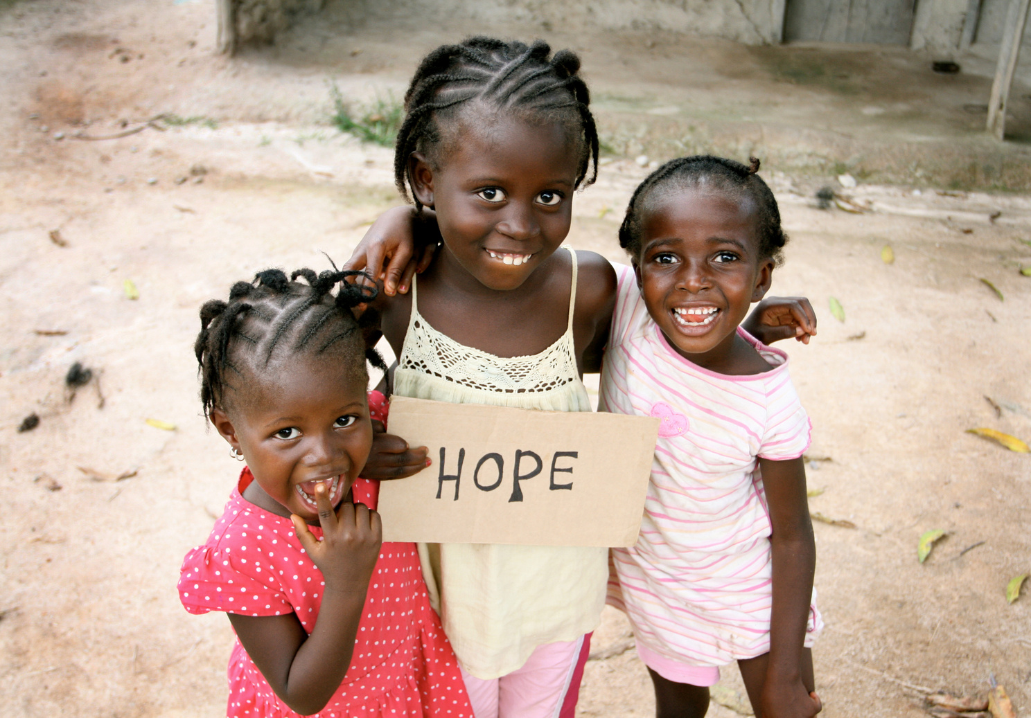 African Girls with Hope Sign